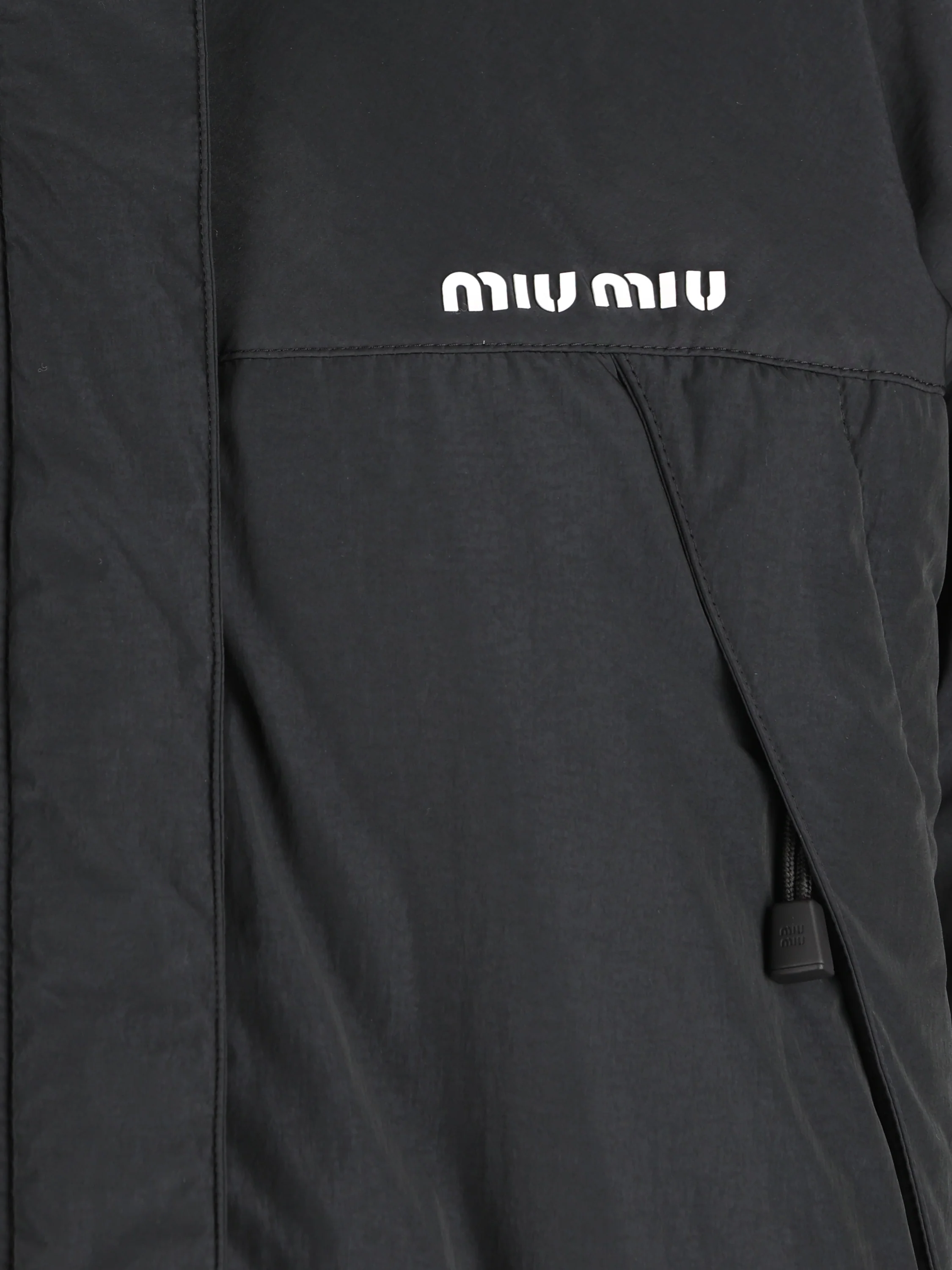 Piumino realizzato in misto poliestere. ML1553 6203F0002 MIU MIU