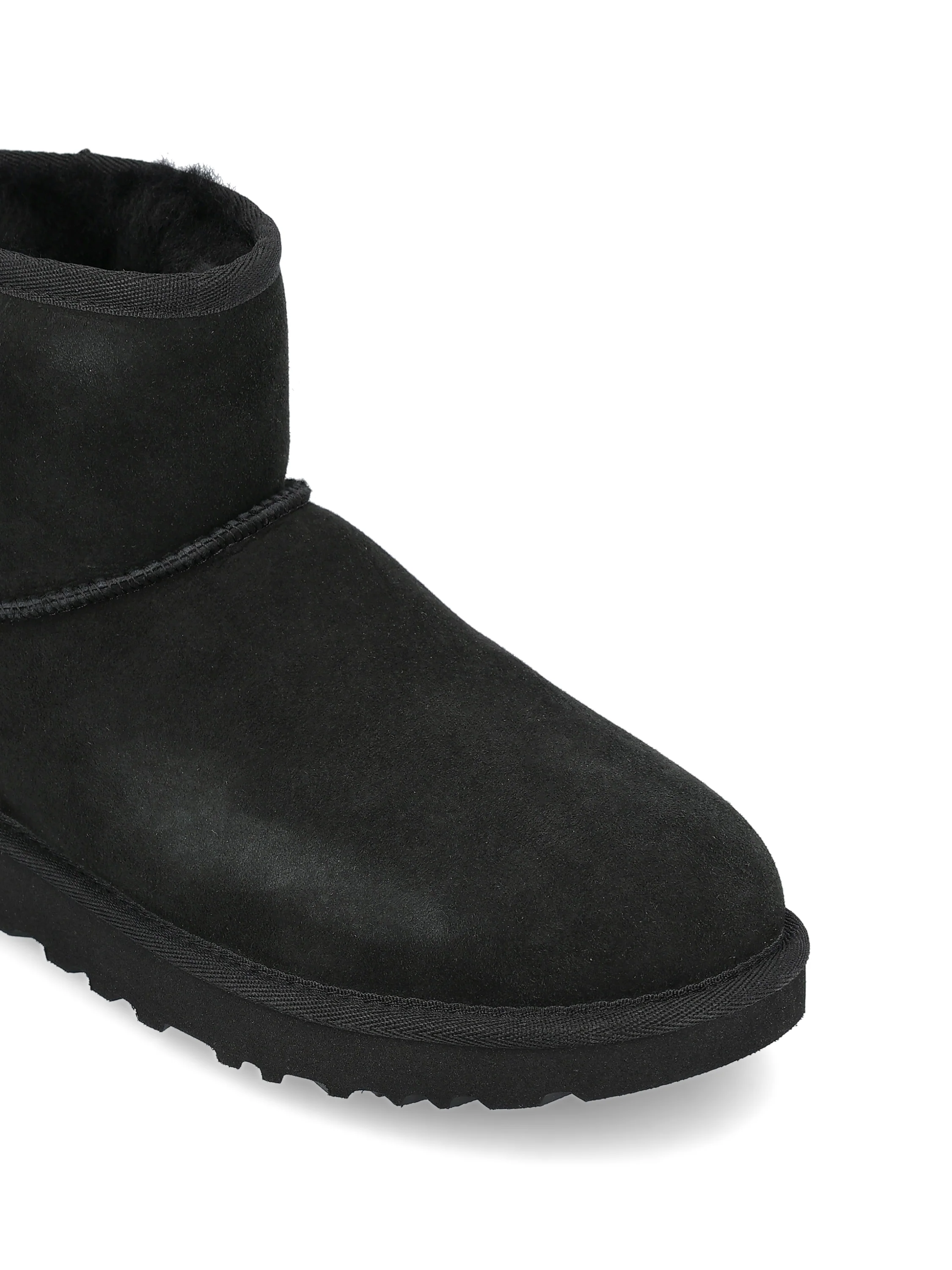 Stivali realizzati in montone e pelle. 1016222 BLK UGG