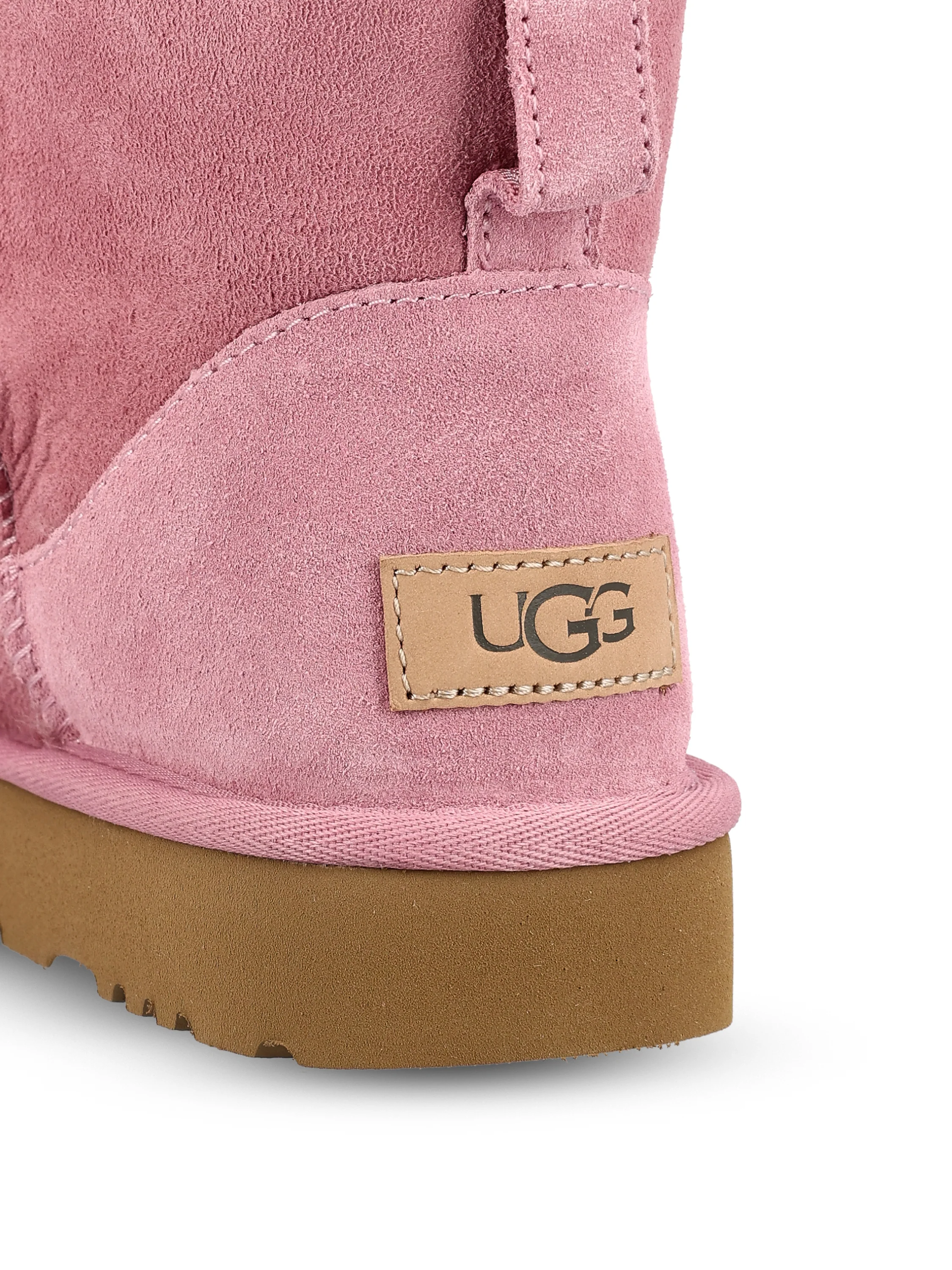 Stivali realizzati in montone e pelle. 1016222 DYR UGG 