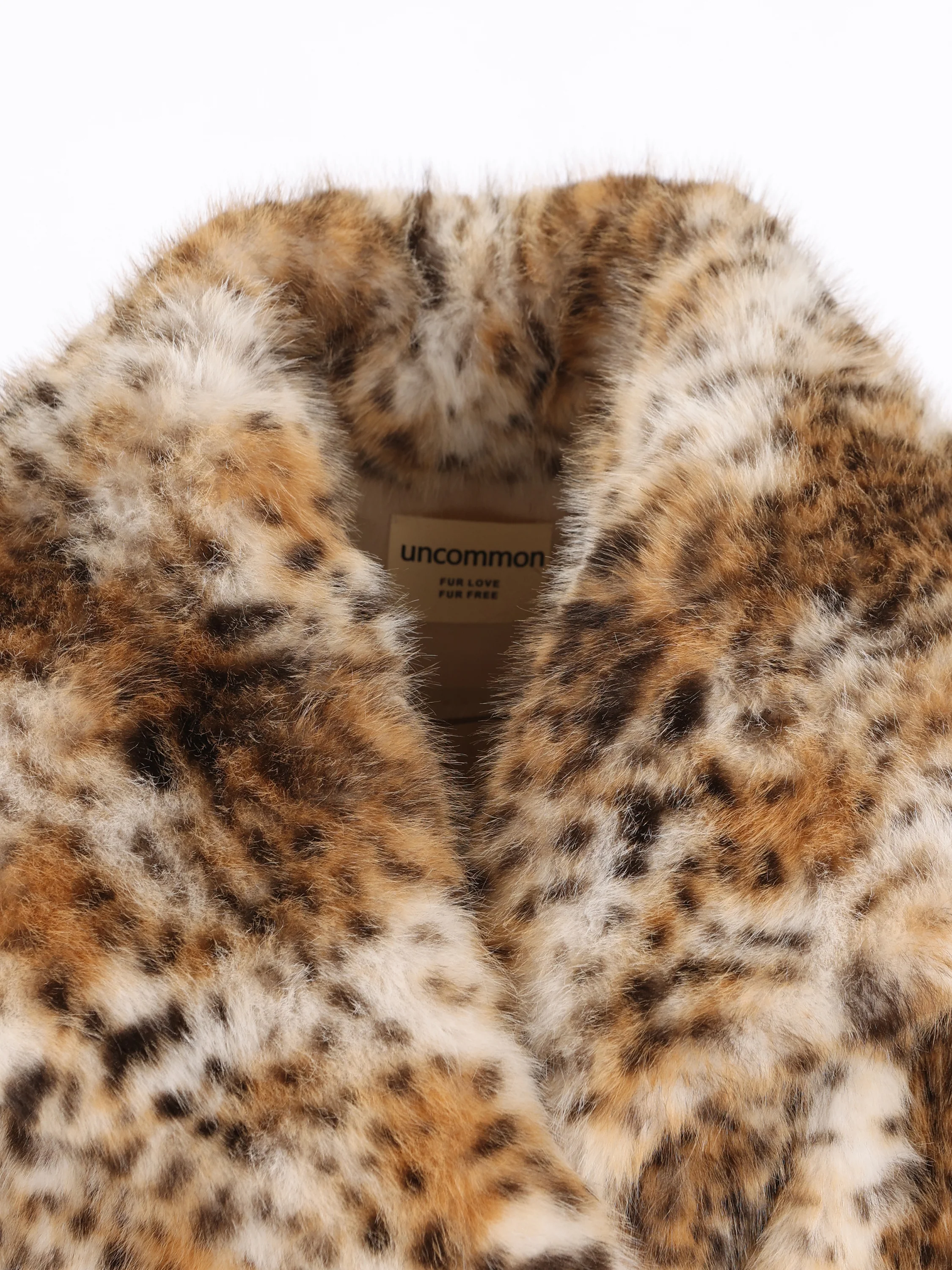 Cappotto realizzato in poliestere EF312/LPT 000 UNCOMMON 